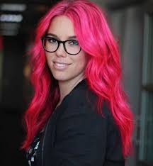 I'm called the pink-haired music teacher. I'm like Ms. Frizzle from 'The  Magic School Bus,' except I play music with kids! I was a really big music  nerd from the time I