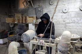 UNRWA Microfinance Programme Rescues Elias's Wood Handicrafts Store from  Closure
