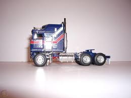 Mack dump truck and pup trailer. Dcp 1 64 Blue With Red And White Stripes Kenworth K100 With Aerodyne Sleeper 1856562234