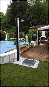 155 Stunning Outdoor Showers That Will Leave You Invigorated Page 30 Hometrend Outdoor Pool Shower Pool Patio Outdoor Shower Diy