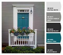 Chic cottage home features taupe siding framing a turquoise front door flanked by sidelights. Front Door Chip It By Sherwin Williams Home Colorsforfrontdoors Doorcolorideas Doordecorations Door Painted Front Doors Turquoise Door House Exterior