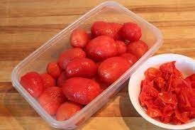 Blanch a few tomatoes at a time in the boiling water, just long enough until the skin starts to curl up where you scored it, about 30 seconds depending on the size of the tomato. How To Blanch And Peel Tomatoes
