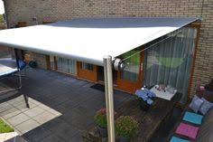 Shadesign Sonnensegel Eine Kombination Aus Sonnensegel Und Markise Sonnensegel Garten Sonnensegel Pergola Plane