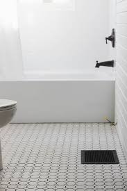 Tile is often the most used material in the bathroom, so choosing the right one is an easy way to kick up your bathroom's style. Bathroom Makeover Week 3 Tile Love Grows Wild