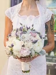 We're obsessed with this wildflower rincon flowers bouquet with springy blue, pink, and purple this bride carried a loose arrangement of garden roses, peonies, and clematis by fern studio at her. 16 Purple Wedding Bouquet Ideas And The Best Blooms In Hue Purple Wedding Bouquets Purple Wedding Flowers Lavender Bridal Bouquet