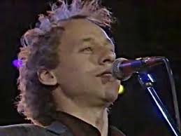 Woman with a hairdryer and comb brushing her wet blonde hair after showering at home. Dire Straits Eric Clapton Wonderful Tonight Live Wembly Eric Clapton Wonderful Tonight Wonderful Tonight Eric Clapton