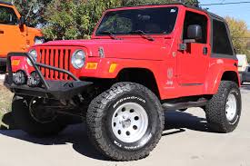 Image result for Flame Red 2005 Jeep