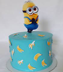 Bob the minion out of chocolate cakes, ganache, buttercream and fondant! Minions Cake Design Images Minions Birthday Cake Ideas