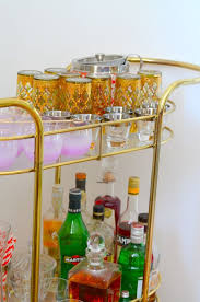 The Bar Cart Is Making A Come Back Find Out How To Stock A Bar Cart See My Bar Cart Essentials From Alcohol To Mix I In 2020 Bar Cart Decor