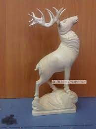 نحت غزال على الخشب النحت على الخشب sculpture outdoor decor decor