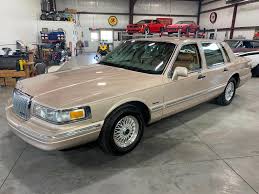 Image result for Light Prairie Tan 1997 Town Car