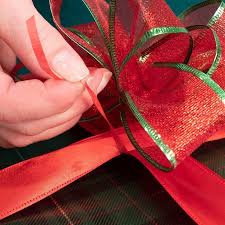 How to wrap the perfect present with a bow. How To Make A Christmas Bow Diy Family Handyman