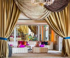 Rock colorful walls covered with bright textiles or even mosaic tiles, go for traditional cutout alcoves and niches and place furniture there, rock very colorful sofas, chairs, pillows, rugs and upholstered ottomans. 10 Designer Tips For Moroccan Inspired Decor