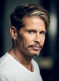 Rock legend debuts new short hairstyle