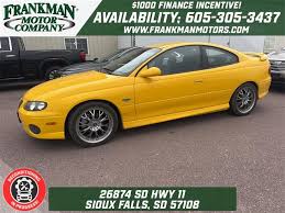 Image result for Yellow 2004 Pontiac