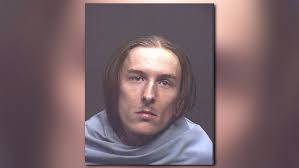 Tucson police say motorcyclist tried running officer down