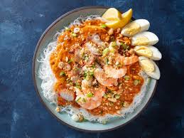 This Classic Filipino Noodle Dish Is Packed With Pork Chicken Shrimp And Layer Upon Layer Of Seafood Flavor Filipino Noodles Seafood Sauce Recipe Pancit