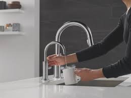 A simple twist of open the dispenser faucet and fill with one gallon of product water. Delta Faucet S Latest Releases Include Hot Water Dispenser Water Filtration Residential Products Online