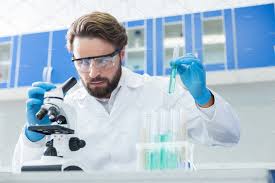 Image result for good looking guy working in lab