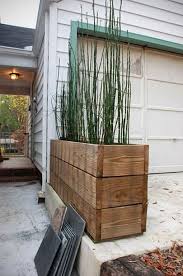 Rustic Wood Planters In 2020 Garden Planter Boxes Wood Planters Outdoor Planters