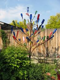 Pin By S Glass Art On Very Cool Bottle Garden Glass Bottle Diy Garden Art