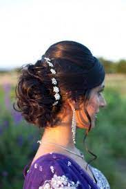 Curl Bun Updo With Silver Flower Pins For The Indian Bride Photo Source Kim Jones Photography Cu Hairdo Wedding Bridal Hair Buns Wedding Hairstyles Bride