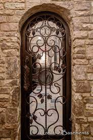 For help in considering your options, check out our list of exterior basement door ideas. Basement Wine Cellar Iron Door Home Wine Cellars Diy Gate Custom Gates