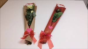 Gather the appropriate tools, including wrapping paper, a proper cutting tool, tape, and any ribbons or. Wrapping A Rose For Valentine S Day Wrapflowers Youtube