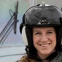 Caleb Barfield, Pilot for a Day, with MASTER Sergeant Tommy Temple. MSGT  Temple, Non-Commissioned Officer In Charge, tells Caleb about the helmet he  is wearing. The 157th Fighter Squadron, 169th Fighter Group,