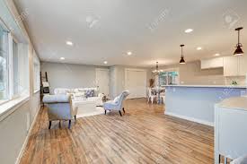 Pale grey kitchen cabinets are a top calaveras lumber. Airy Light Filled Living Room In Soft Blue And Grey Colors Open Floor Plan Interior Features Comfortable Sofa With Chairs Breakfast Nook And Kitchen Northwest Usa Stock Photo Picture And Royalty Free