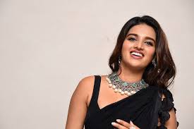 Actress Nidhi Agarwal Black Saree Images Ismart Shankar Pre Release New Movie Posters Actress nidhi agarwal who is set to debut on telugu screen with savyasachi is a stunner. actress nidhi agarwal black saree