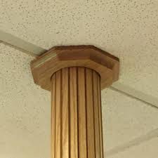 While lally columns or jack post covers are an effective means to holding up a beam, most homeowners consider them to be an unsightly eye sore when designing plans for their basement living space. Lally Column Cover Ideas Pole Wrap Photo Galleries Column Cover Ideas Lally Columns Lally Column Cover