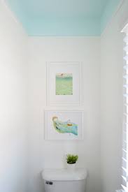 Choosing a paint color two to three shades lighter than the wall will make the room feel less claustrophobic and dreary. Adding Color And Trim To A Bathroom Ceiling Young House Love