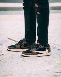 On Feet With Travis Scott S Air Jordan 1 Low Sneaker Accompanied By Intimate Imagery Of The Unreleased Silhouette Air Jordans Jordan 1 Low Travis Scott