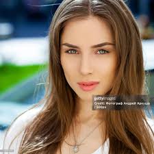 Portrait Of Young Woman On Summer Street High-Res Stock Photo