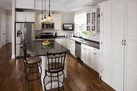 White L Shaped Kitchen Design With Dining Table And Chairs L Shape Kitchen Layout Kitchen Remodel Small Kitchen Layout