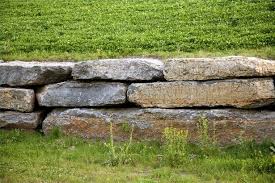How To Build A Dry Stack Stone Wall Hunker Stone Landscaping Dry Stone Wall Patio Stones
