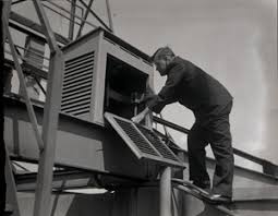 G. Harold Noyes speaking in NBC radio microphone : 'Meteorologist in charge  of Boston office US Weather Bureau giving noon weather forecast
