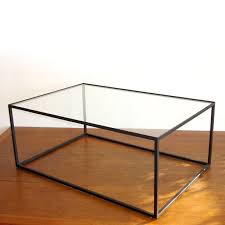 Working with a black coffee table can be exciting, and when done right it can both blend into the backdrop and stand out visually at the same time. Black Metal And Glass Coffee Table Ideas On Foter