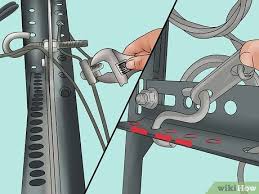 Comment Ajuster Le Ressort D Une Porte De Garage