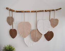 We're loving the bohemian elegance of this asymmetrical one. Amazon Com Huge Macrame Feather Wall Hanging Boho Wall Decor Boho Decor For Bedroom Woven Wall Decor Yarn Tapestry Wall Hanging Dorm Wall Decor Boho Room Decor Boho Wall Art Aesthetic Wall Decor
