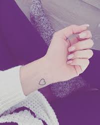 The area is a pretty painful place to get inked, but you can get a lot of inspiring tattoos there. Outlined Heart Tattoo On Wrist Entertainmentmesh