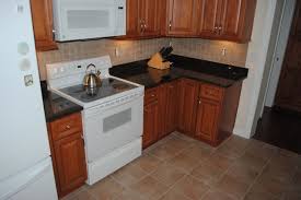 So if your kitchen floor has sheets of italian marble or glittery tiles, don't hesitate to go for maple shaker maple cabinets have a certain personality, begging to be used in a specific manner so that your kitchen. Maple Cabinets Tan Brown Granite Tile Blacksplash Vinyl Floors American Traditional Kitchen Other By Hatchett Design Remodel Houzz