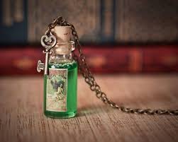 Here's a painted i did resently of the logo lafee absinthe in watercolor. Absinthe Bottle Necklace La Fee Verte Green Fairy Antique Etsy Absinthe Fairy Green Fairy Absinthe Bottle Necklace