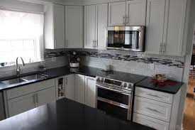 Kitchen renovation with shaker style. Kraftmaid Kitchen Cabinets In Moonshine Finish Kraftmaid Kitchens Kraftmaid Kitchen Cabinets Kitchen Remodel