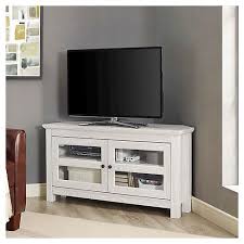 Consider a corner unit with storage cabinets or drawers to house entertainment devices, electronics, or consoles. Modern 2 Glass Door Corner Tv Stand For Tvs Up To 50 White Wash Saracina Home Target