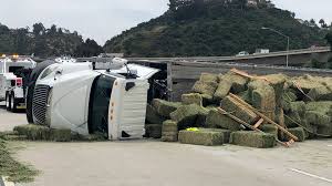 If you obey the laws and give big trucks the room they need to drive safely, it can help prevent some. Semi Truck Carrying Bales Of Hay Turns On Side San Diego Injury Accident Lawyer Blog