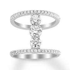 This Glamorous North South Ring For Her Features Three Brilliant Diamonds In The Linear Center While More Diamonds Sparkl 3 Stone Rings White Gold Stone Rings