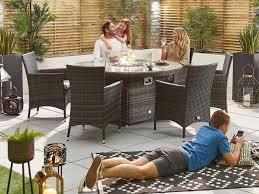 Round propane fire pit is a great centerpiece for entertaining at your outdoor space. Nova Outdoor Living Amelia 6 Seat Rattan Dining Set With 1 5m Round Fire Pit Table At Gardenman
