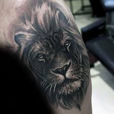 Very Realistic Black Ink Shoulder Tattoo Of Lion Head Lion Head Tattoos Mens Lion Tattoo Lion Tattoo Design